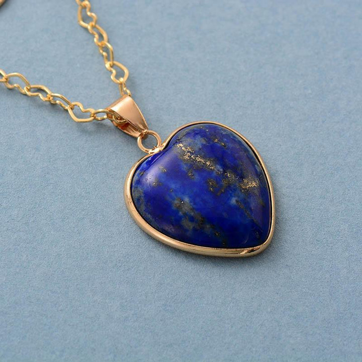 Deep blue Lapis Lazuli gemstone necklace with gold plating, a spiritual and protective women's jewelry piece.
