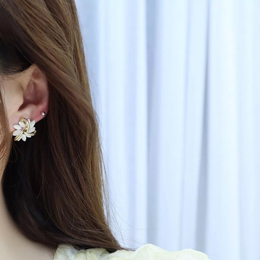 Pair of gold plated flower stud earrings with shimmering opal, Sakura design