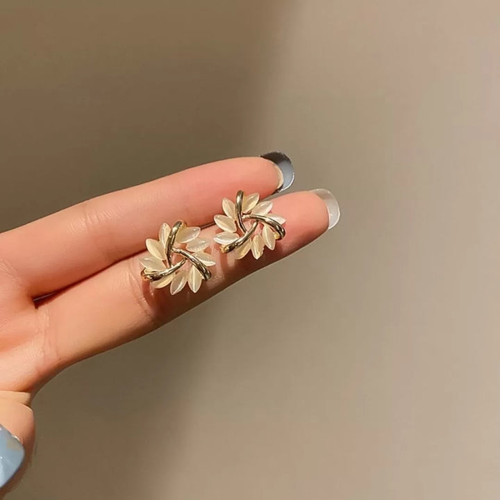 Delicate women's Sakura stud earrings featuring a beautiful opal flower, gold plated