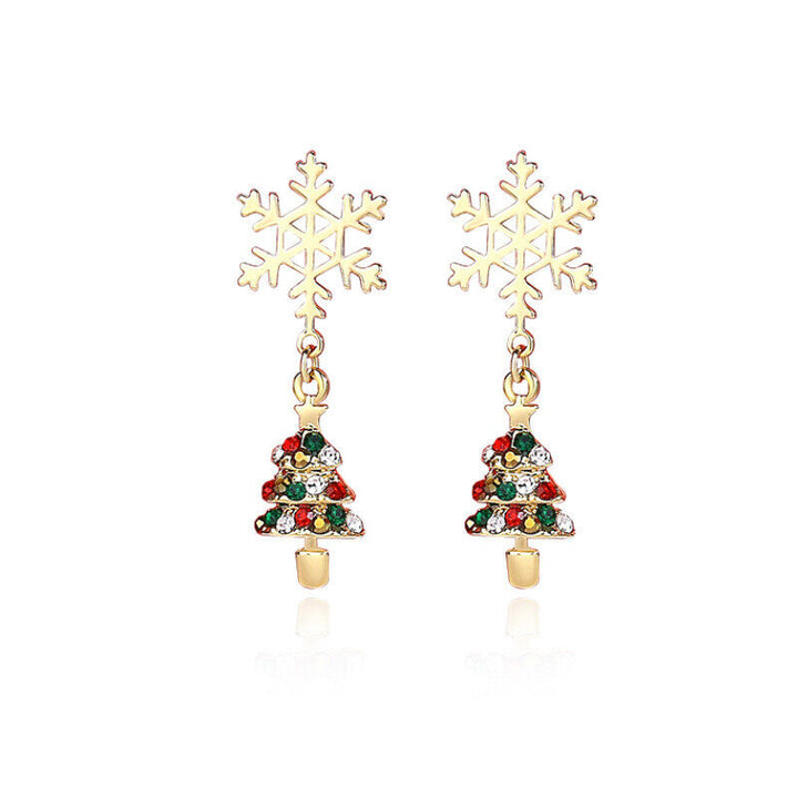 Elegant gold-plated snowflake earrings for women. Sparkling Christmas and holiday jewelry, ideal for festive parties.