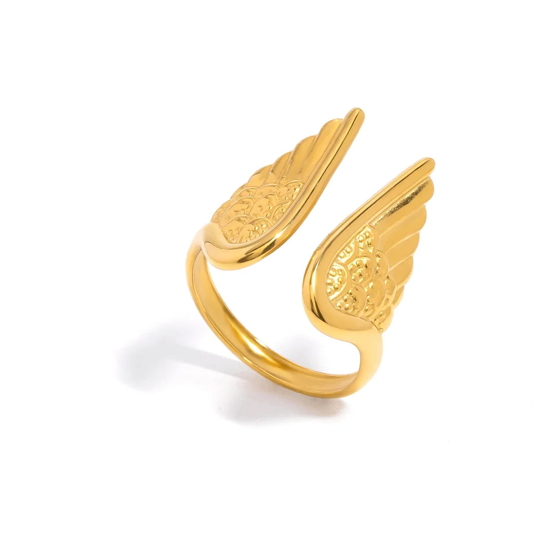 Women's gold plated stainless steel adjustable angel wing ring, elegant celestial feather jewelry for protection.