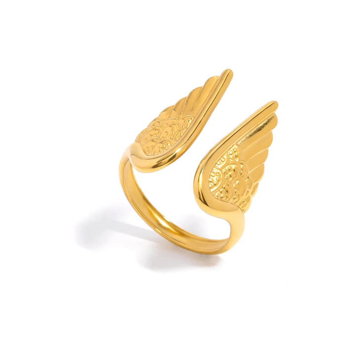 Women's gold plated stainless steel adjustable angel wing ring, elegant celestial feather jewelry for protection.