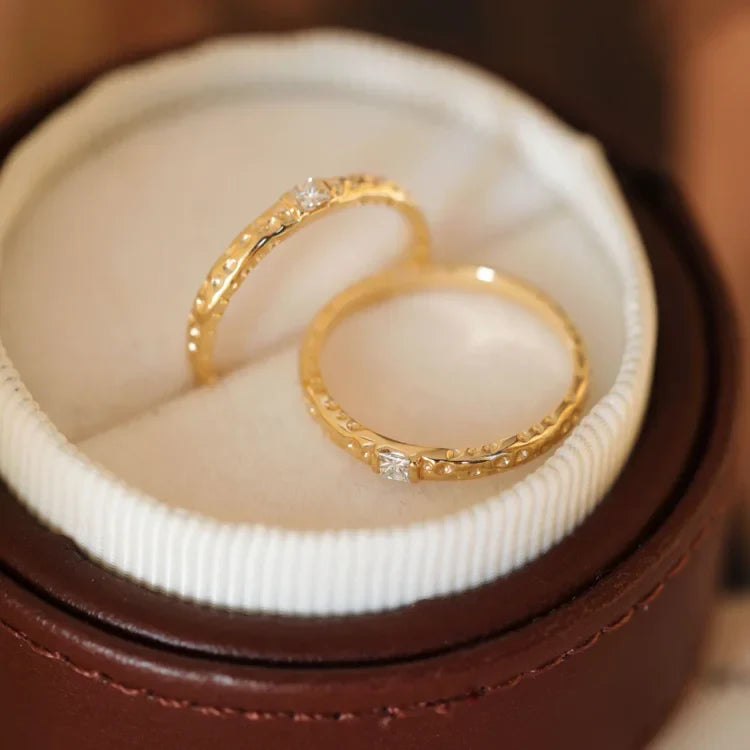 High-quality gold plated sterling silver women's ring featuring brilliant zirconia, a luxurious fashion accessory.