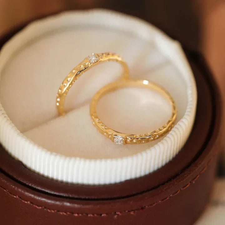 High-quality gold plated sterling silver women's ring featuring brilliant zirconia, a luxurious fashion accessory.