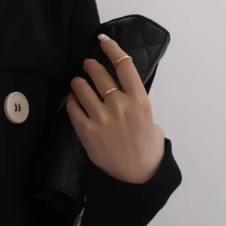 Classic gold plated sterling silver women's ring with sparkling zirconia, offering timeless elegance and style.