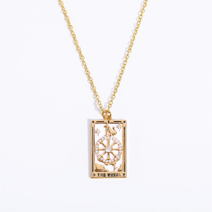 Trendy women's fashion jewelry: gold-plated tarot card drop pendant necklace.