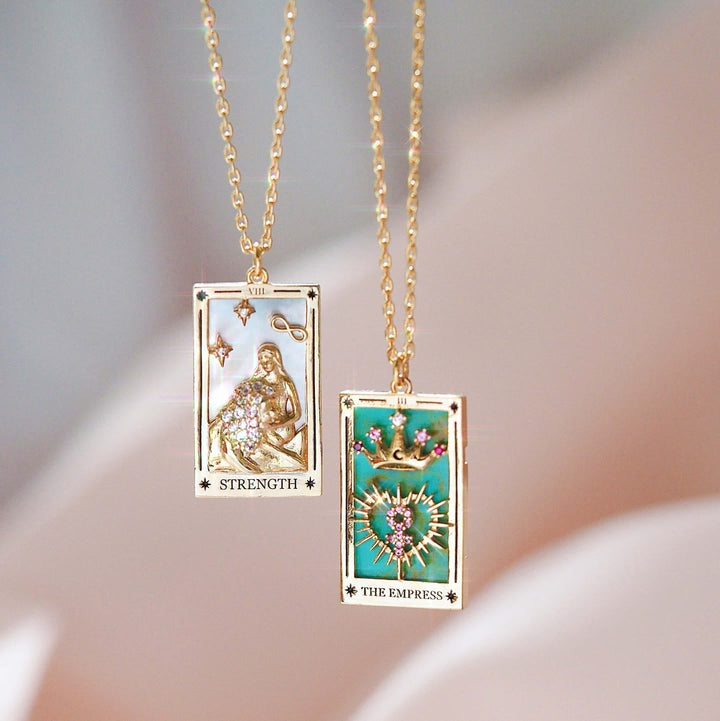 Fashionable gold-plated women's necklace with a mystical tarot card and zirconia pendant.