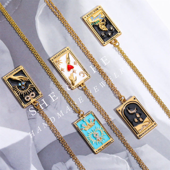 Delicate gold-plated women's necklace with a symbolic tarot card drop pendant.