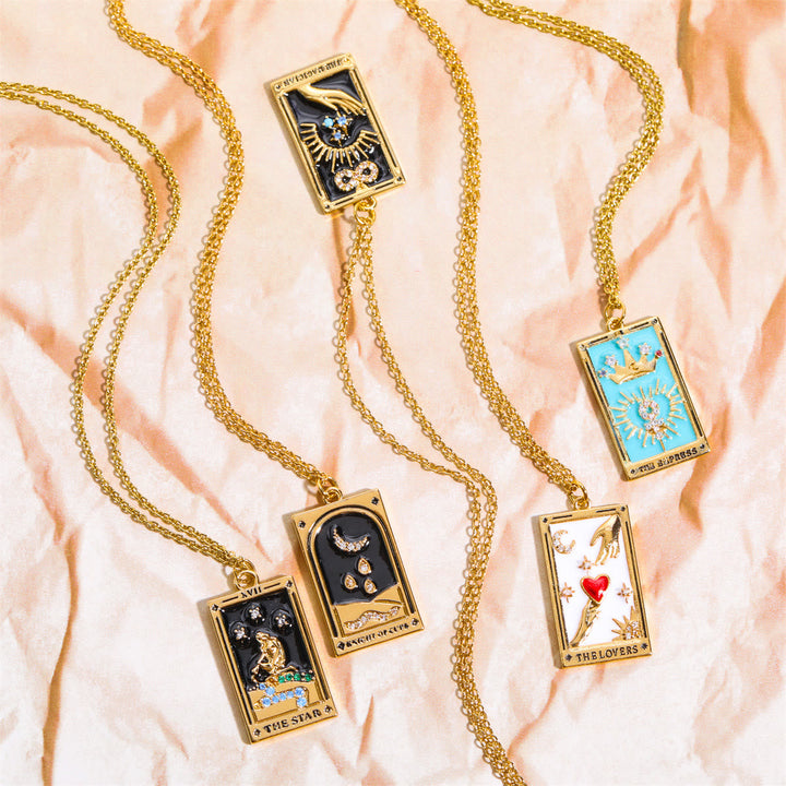Mystical women's fashion: gold-plated tarot card necklace with sparkling zirconia.