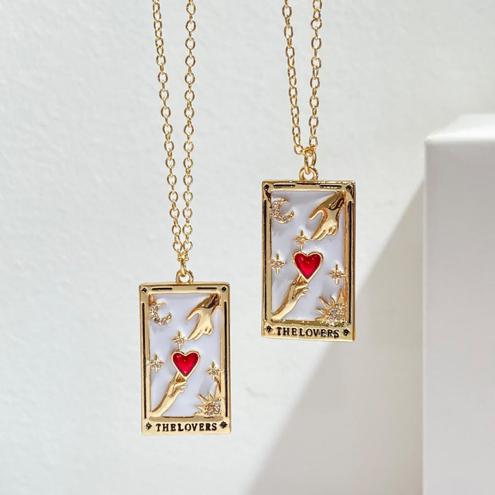 Close-up of a spiritual gold-plated tarot card necklace, perfect women's fashion jewelry.