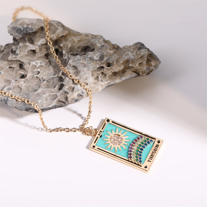 Delicate gold-plated tarot card drop pendant, a mystical women's necklace with zirconia.