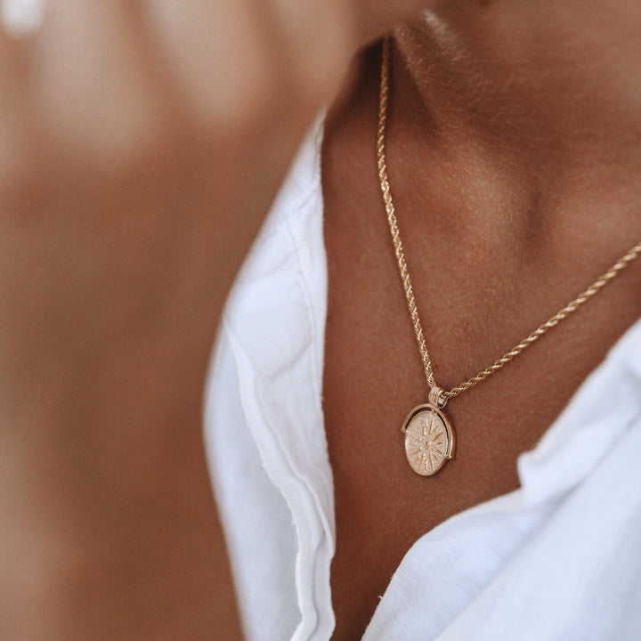 Boho gold sun pendant necklace, perfect gift for her, versatile and radiant.