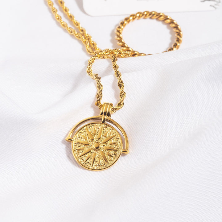 Elegant gold sun pendant, women's minimalist necklace, perfect for gifting.