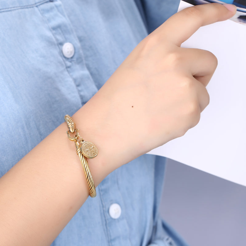 Stylish women's religious bracelet featuring classic Saint Benedict medal charms, great gift idea