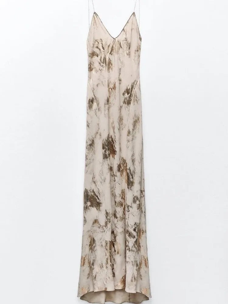 Chic women's sleeveless gold summer dress, a comfortable flowy midi with a flattering deep V-neck.