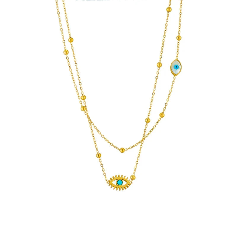 Women's gold tone Halo Essence layered evil eye necklace, a fashionable and protective jewelry piece.