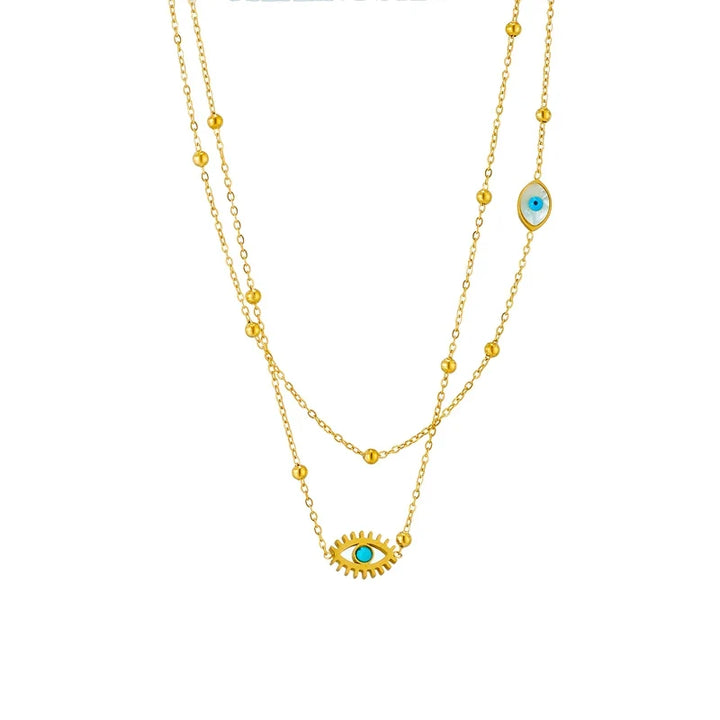 Women's gold tone Halo Essence layered evil eye necklace, a fashionable and protective jewelry piece.