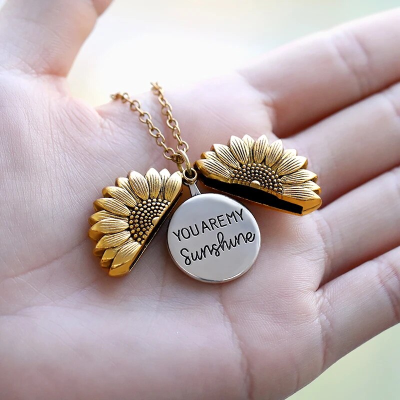 Women's gold tone sunflower locket necklace, 'You're My Sunshine' engraved, sentimental gift.