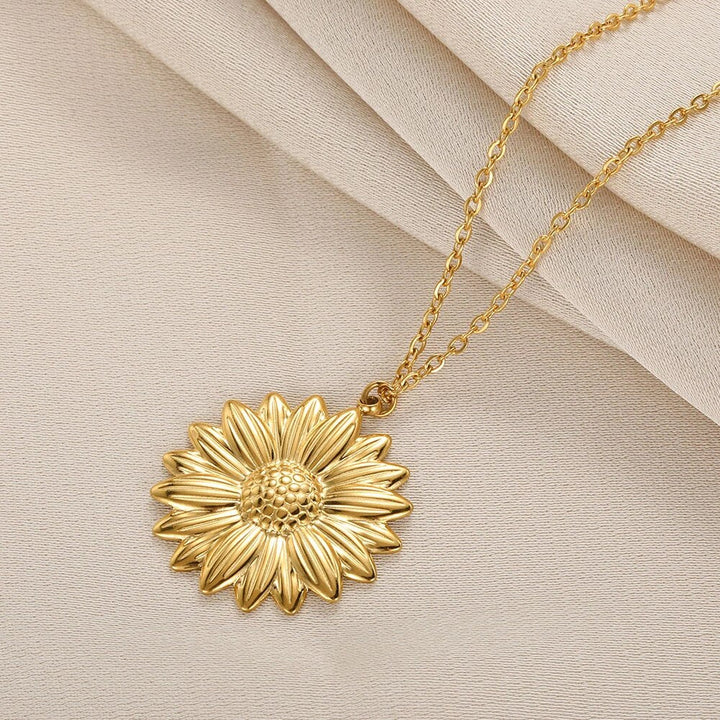 Silver tone 'You're My Sunshine' sunflower locket necklace for women, elegant sentimental jewelry.