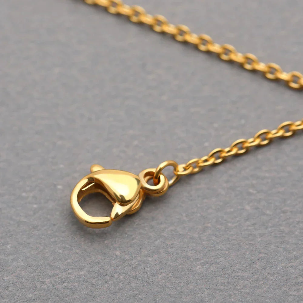 Elegant silver tone 'You're My Sunshine' sunflower locket necklace for women, thoughtful gift.
