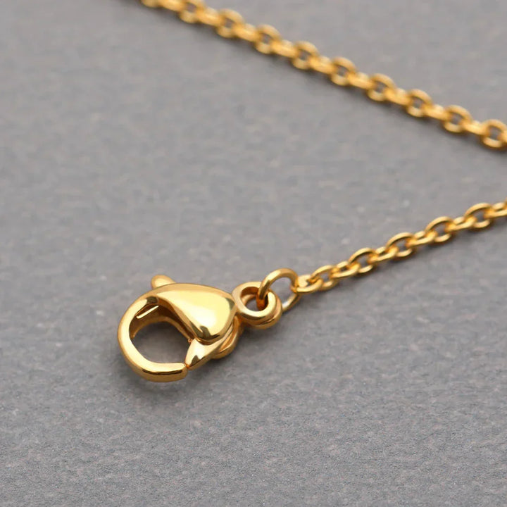 Elegant silver tone 'You're My Sunshine' sunflower locket necklace for women, thoughtful gift.