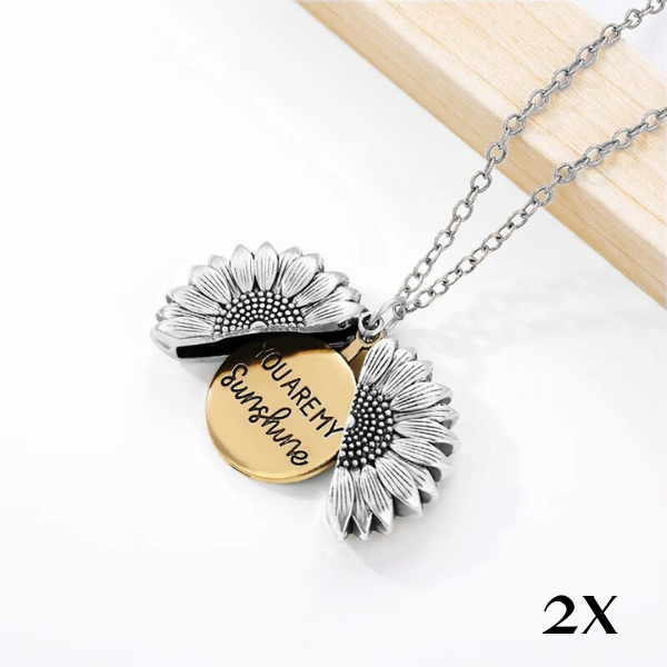 Detailed women's gold tone sunflower locket, 'You're My Sunshine' inscription, unique jewelry.