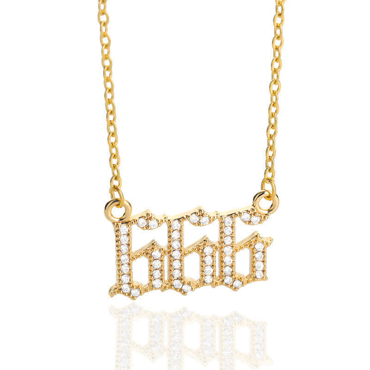 Close-up: Gold spiritual protection necklace with luminous zirconia angel numbers.