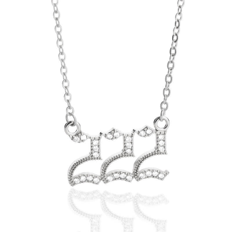 Stainless steel angel numbers pendant necklace for a woman's spiritual journey.