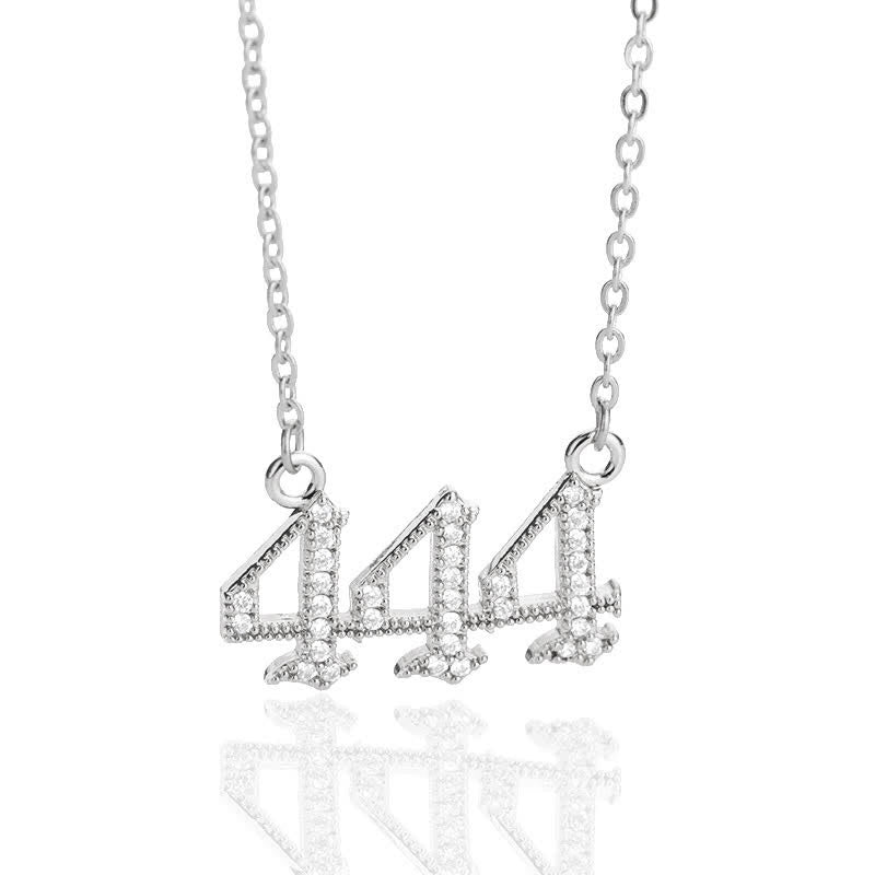 Elegant silver spiritual necklace with sparkling zirconia angel numbers.