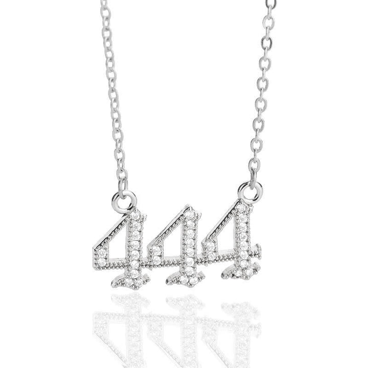 Elegant silver spiritual necklace with sparkling zirconia angel numbers.