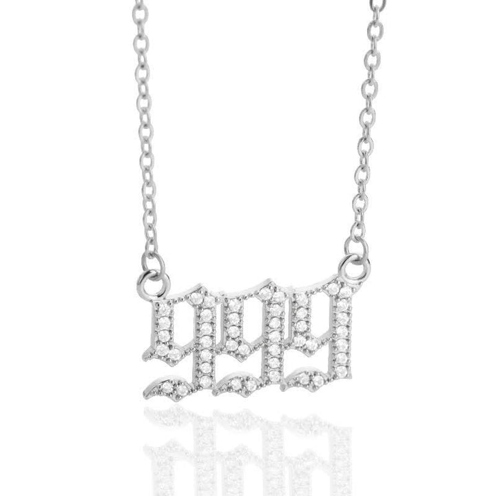 Silver angel numbers talisman necklace, adorned with shimmering zirconia.