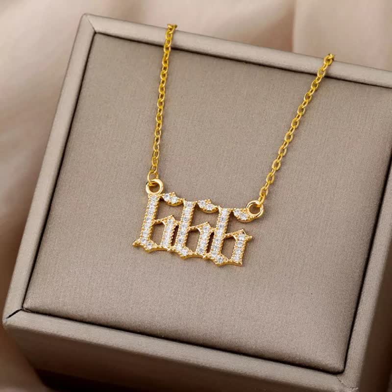 Women's gold angel numbers necklace, a glittering zirconia spiritual talisman.