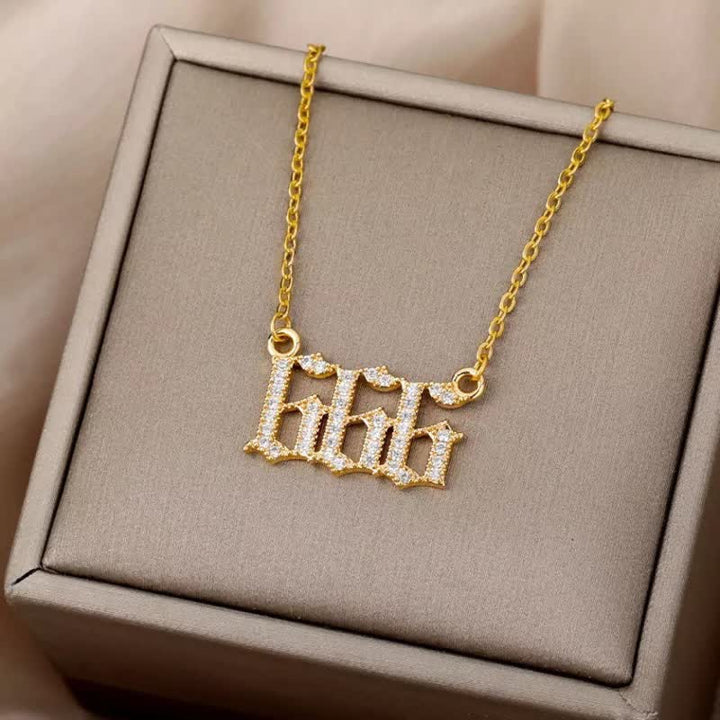 Women's gold angel numbers necklace, a glittering zirconia spiritual talisman.