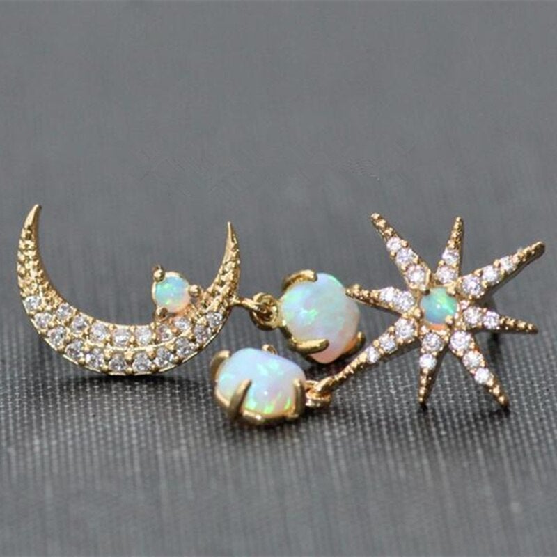 Elegant women's gold-plated moon & star earrings with iridescent opal stones, fashionable celestial jewelry.