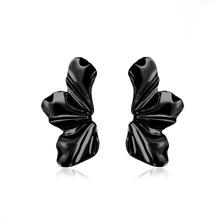 Fashionable women's gold petal studs, perfect elegant nature-inspired jewelry.