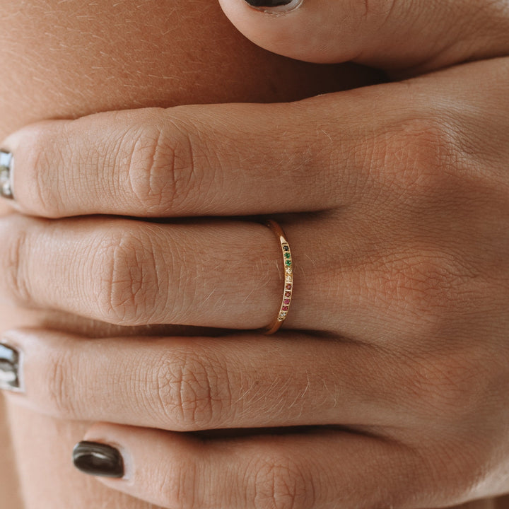 Golden women's ring with a stunning design of colorful gemstone accents. Ideal statement jewelry.