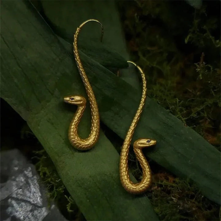 Unique gold-tone snake drop earrings for women, a stylish fashion accessory & statement animal jewelry.