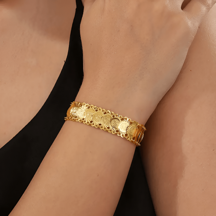 Close-up of Aurielle women's golden heavenly waterfall bracelet, hypoallergenic, stylish accessory