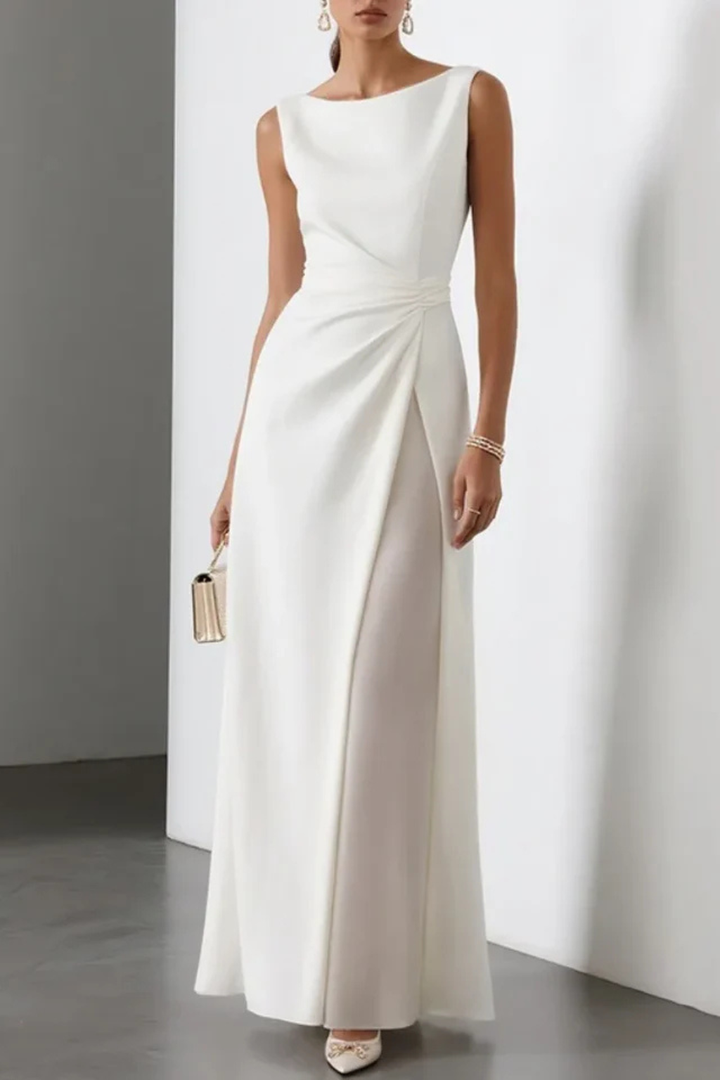 Elegant white maxi dress for special occasions, features a stylish side slit & sleeveless design. Women's evening gown.
