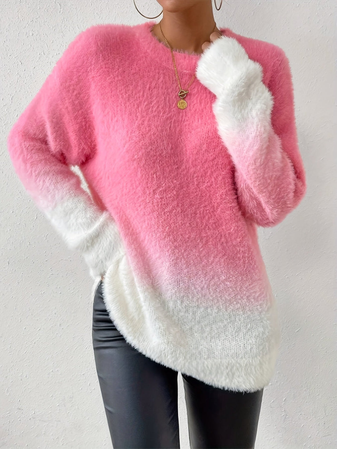 Women's graduated pink fuzzy crew neck sweater, soft and cozy for winter fashion.
