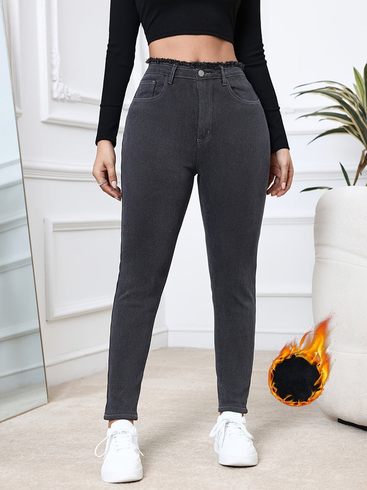 Comfortable women's gray skinny jeans, fleece-lined for ultimate winter warmth & style.