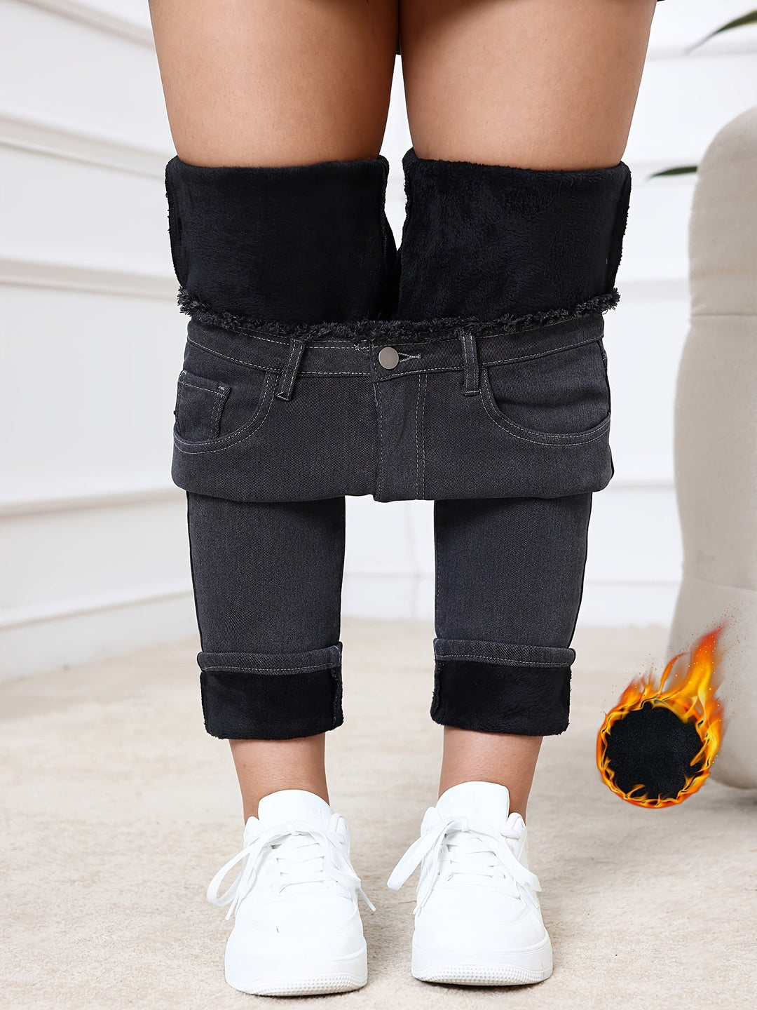 Durable gray women's insulated skinny jeans for ultimate winter warmth, comfort & slim-fit style.