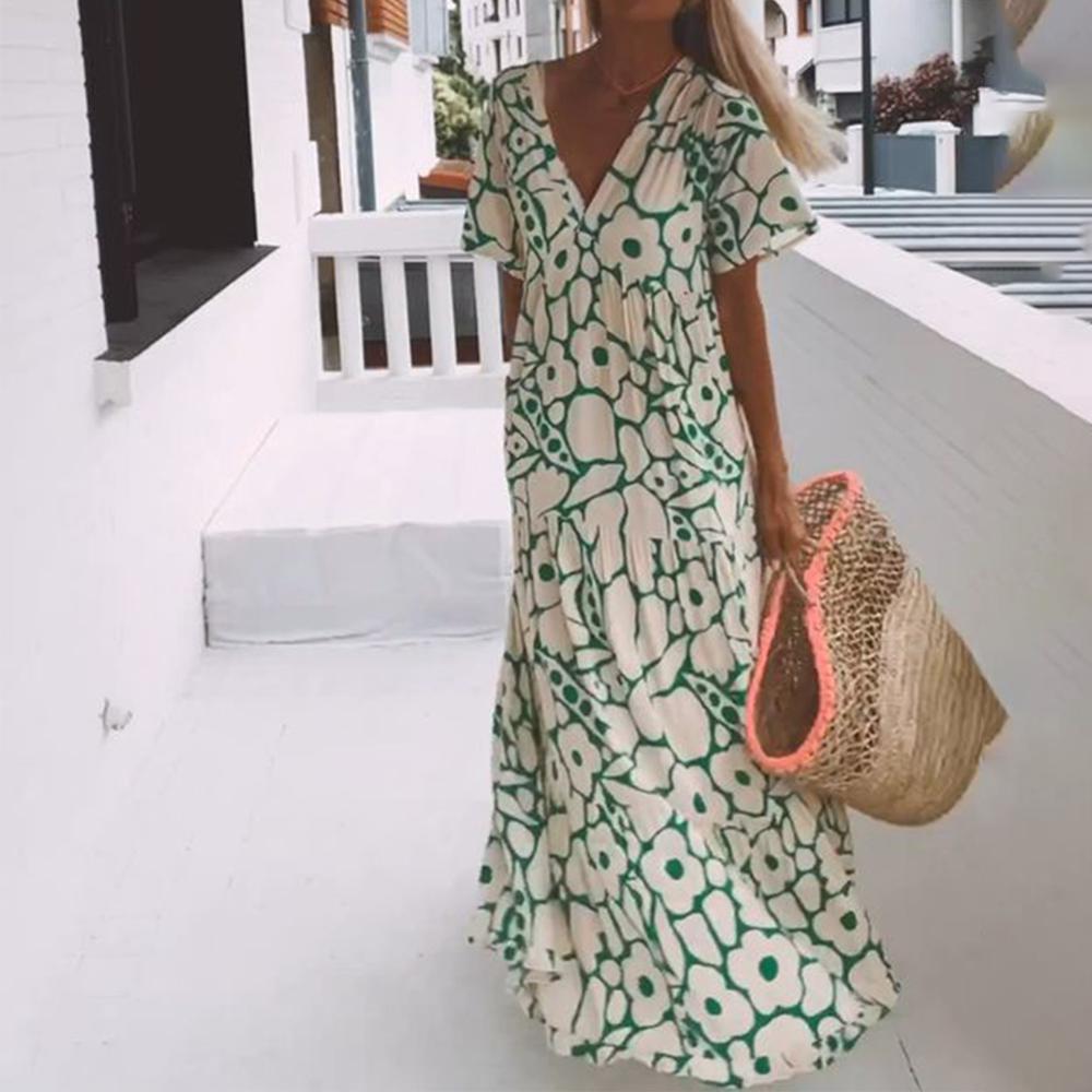 Women's green floral maxi dress with short sleeves & V-neck. Perfect for summer casual or party wear.