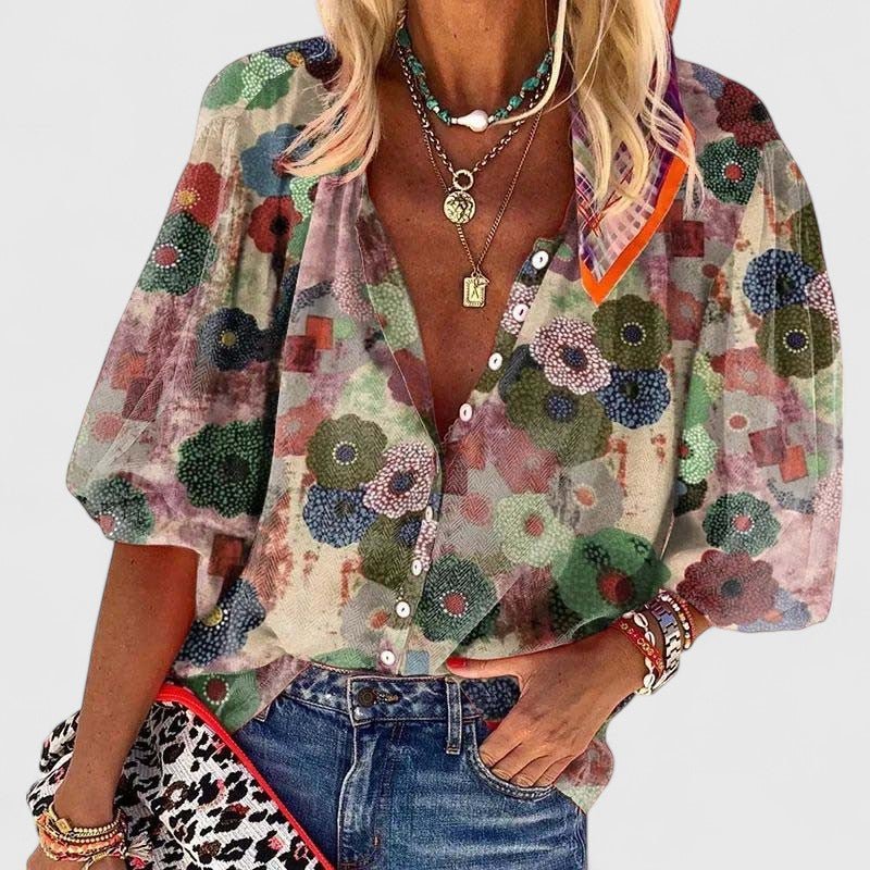Women's green floral V-neck button-down blouse, relaxed fit for casual spring & summer style. Elegant everyday top.