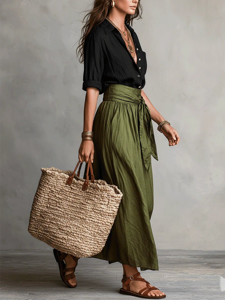 Relaxed fit women's two-piece green set featuring a button-front blouse and a stylish tie-waist maxi skirt.