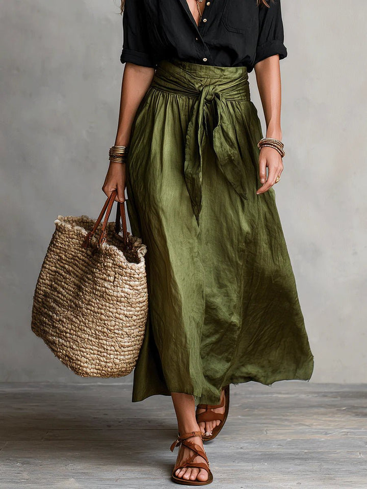 Chic women's green two-piece set: button-front top and tie-waist maxi skirt, great for brunch or summer style.