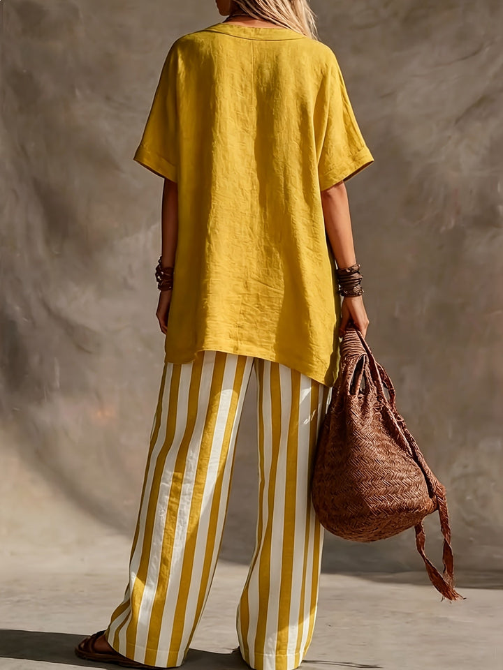 Relaxed fit green & yellow striped two-piece set: V-neck short sleeve top and wide leg pants for vacation.