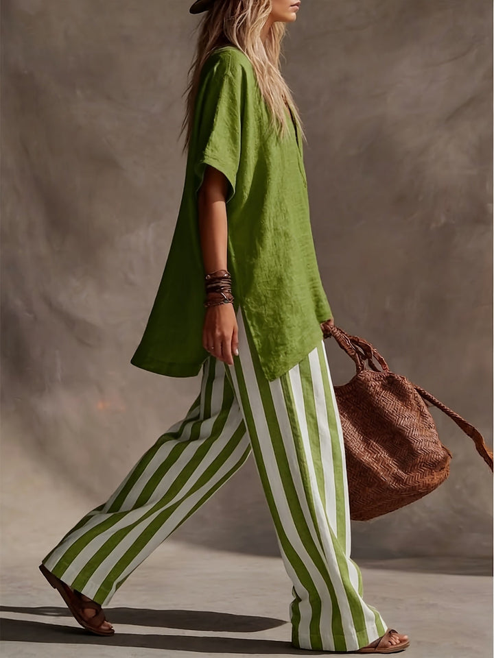 Comfortable women's coordinated green & yellow two-piece set: V-neck short sleeve top & striped wide leg pants.