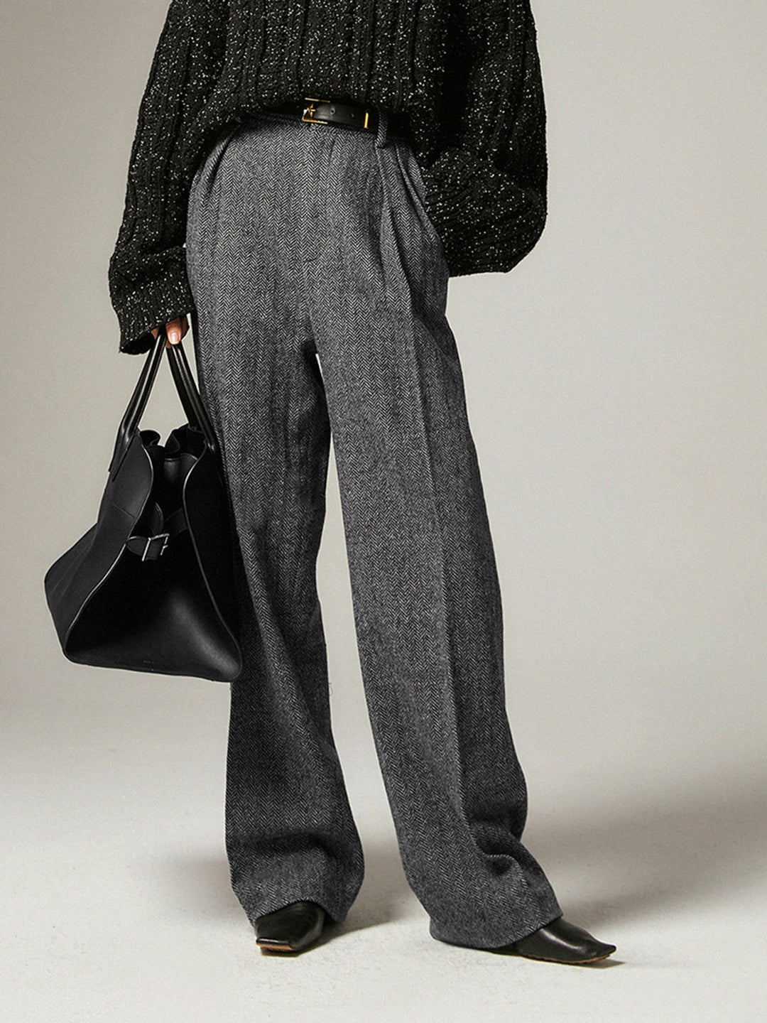 Women's grey pleated wide-leg trousers, perfect for office wear or a chic casual look. Comfortable polyester fabric.