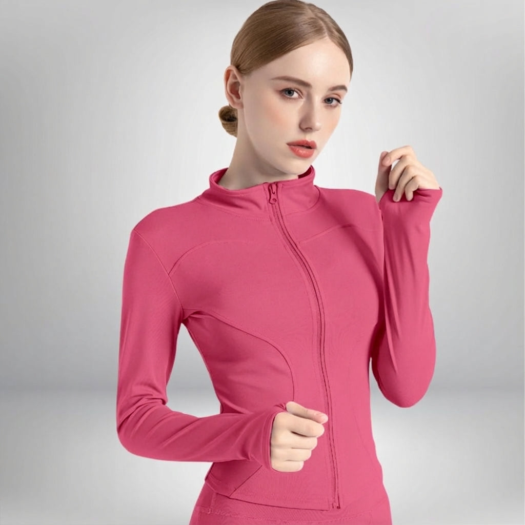 Woman warming up in a black Hailey breathable training jacket, suitable for yoga and fitness